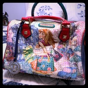 Multi colored beautiful Nicole Lee satchel.